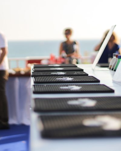trays-row-table-by-people-enjoying-party